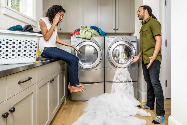 soap spilling out of washing machine